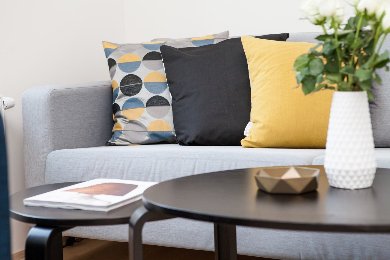 A sofa with colourful cushions. Soft furnishings, home decor. Interior design.