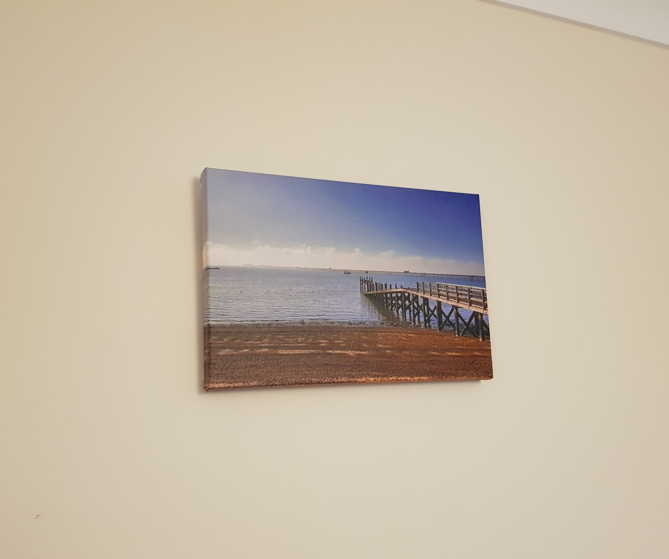 Canvas hanging on wall. Wrap sides