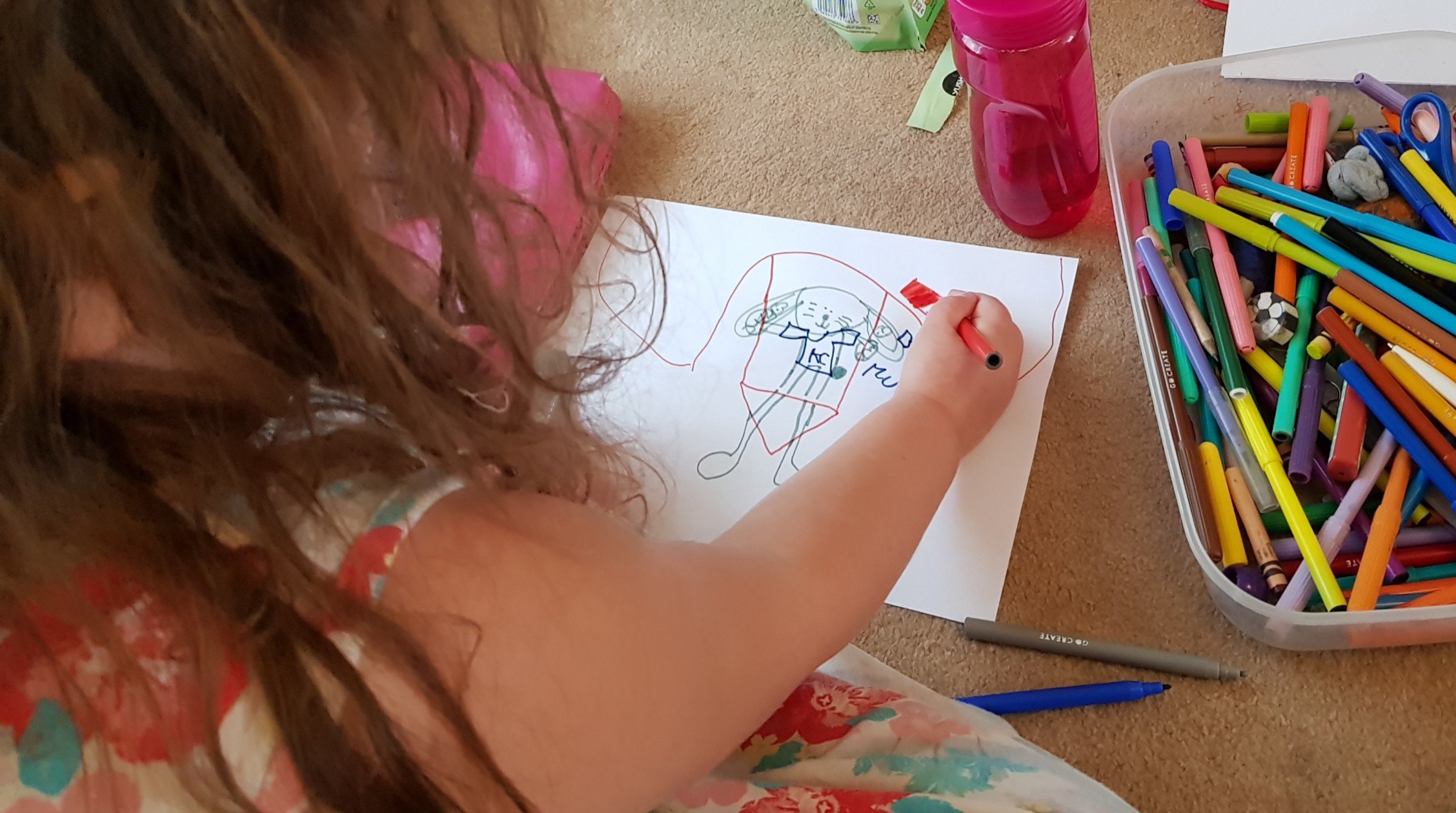 Squiggle drawing with art supplies
