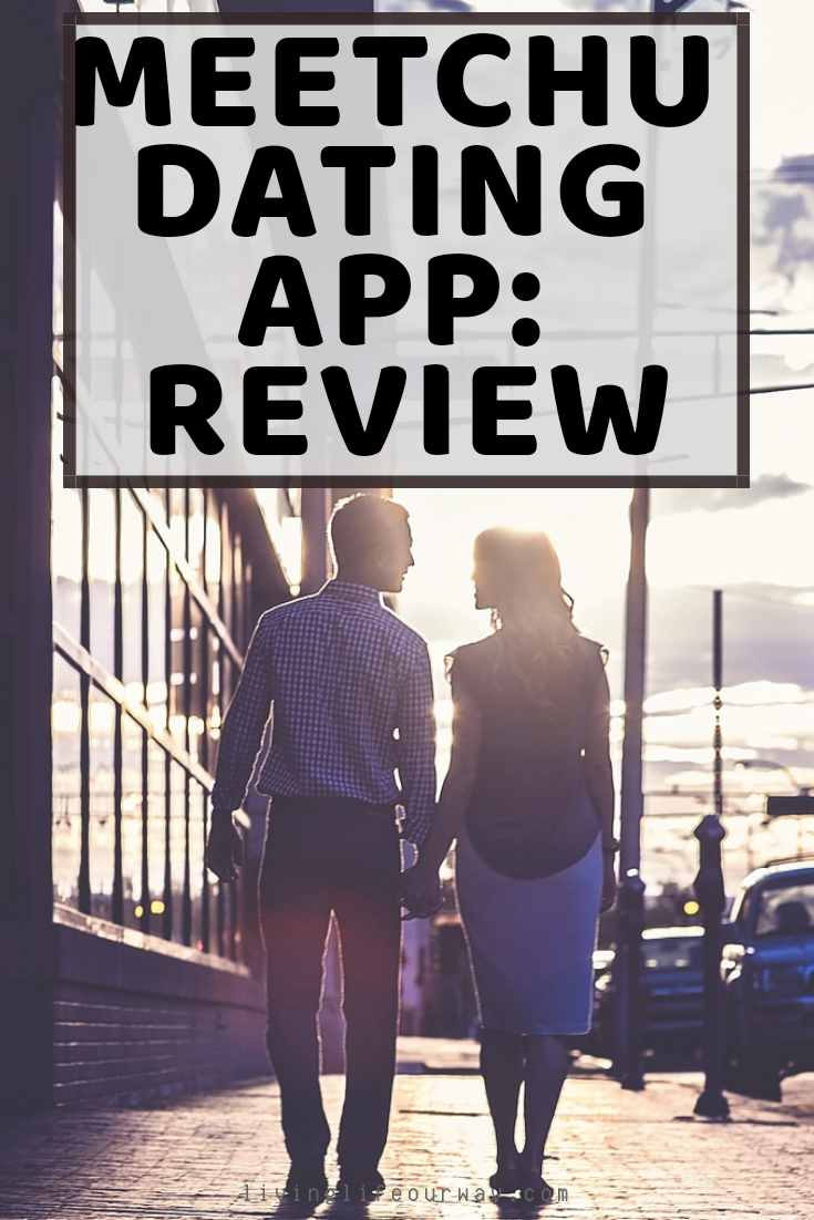 Meetchu Dating App: Review. Couple holding hands walking down the street. Into the sunset.