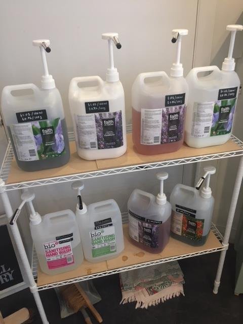 Huge containers of bathroom products at zero waste shop