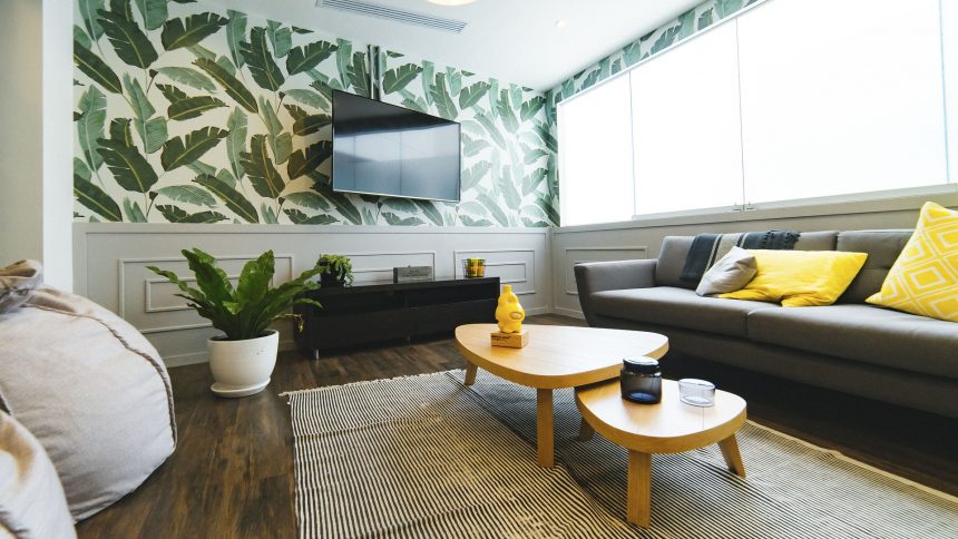 Wall mounted tv in a modern room with nature themed decor
