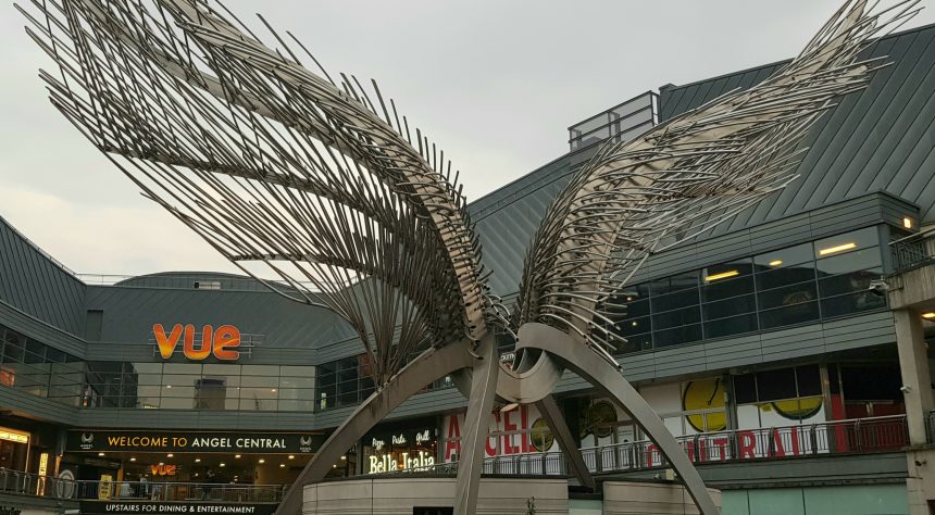 Outside the shopping centre. Angel sculpture. Bella Italia can be seen in the background.